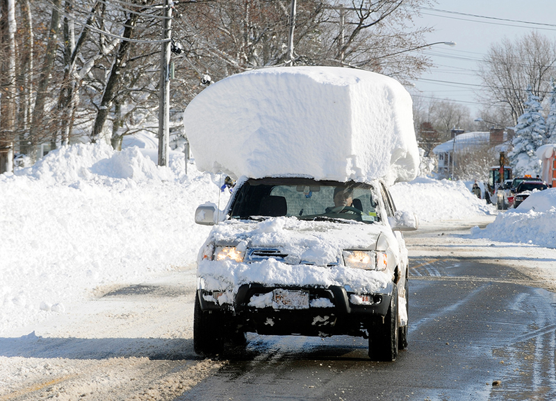 Illustration for article titled Holy mother of God, check out the giant snow wall swallowing Buffalo